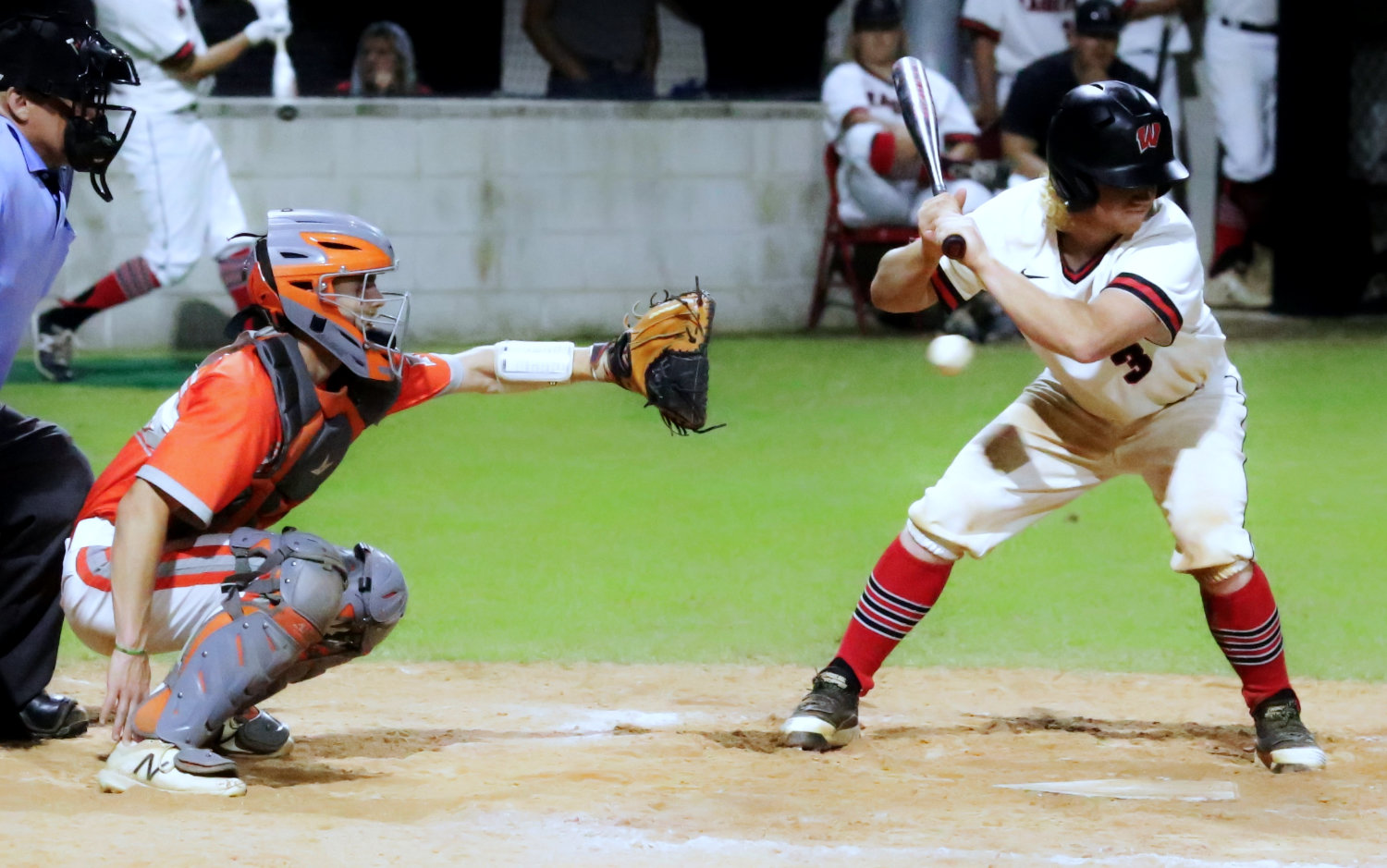 This photo sums up the outcome of Tuesday’s Mineola vs Winnsboro game, as Yellowjacket starter Spencer Joyner threw a masterful game. Catcher Coy Anderson receives the pitch.